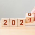 Wooden blocks showing the transition from 2020 to 2021.