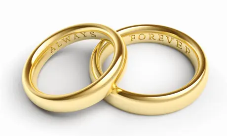 Two gold rings intertwined, inscribed with "ALWAYS" and "FOREVER."