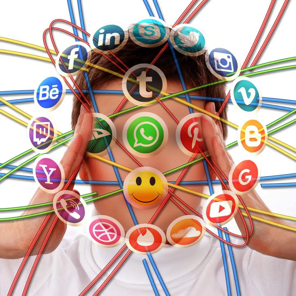 Person overwhelmed by social media icons.